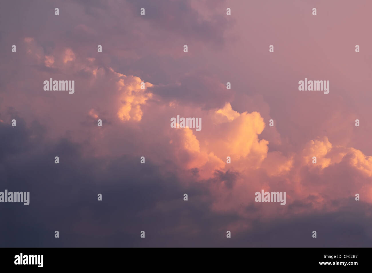 beautiful pink sky with big clouds, evening Stock Photo