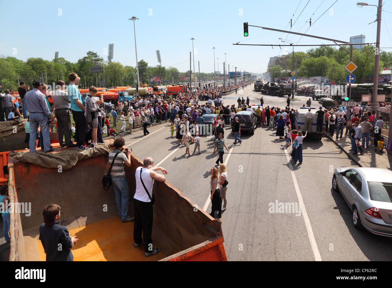 MOSCOW MAY 9 People looks weaponry tank road parade honor Great Patriotic War victory May 9 2010 Moscow Russia View lorry vessel Stock Photo