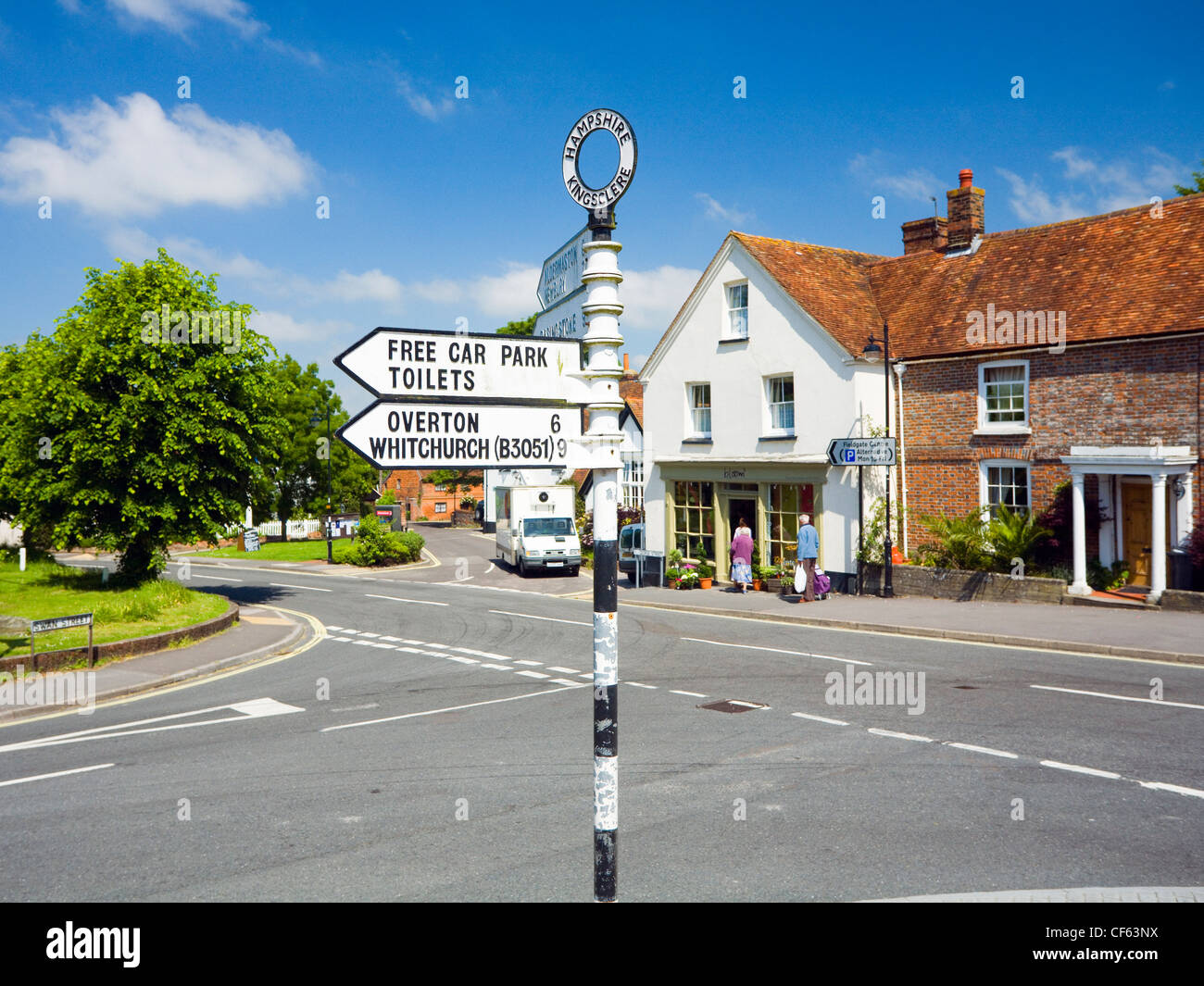 A signpost by a road junction in Kingsclere. Stock Photo