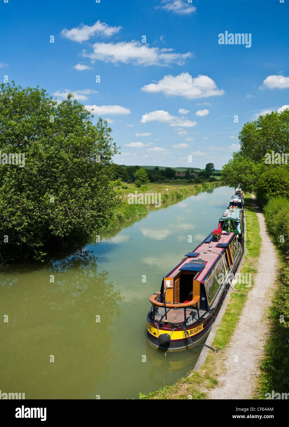 Narrowboats on the Kennet and Avon Canal at Great Bedwyn. Stock Photo