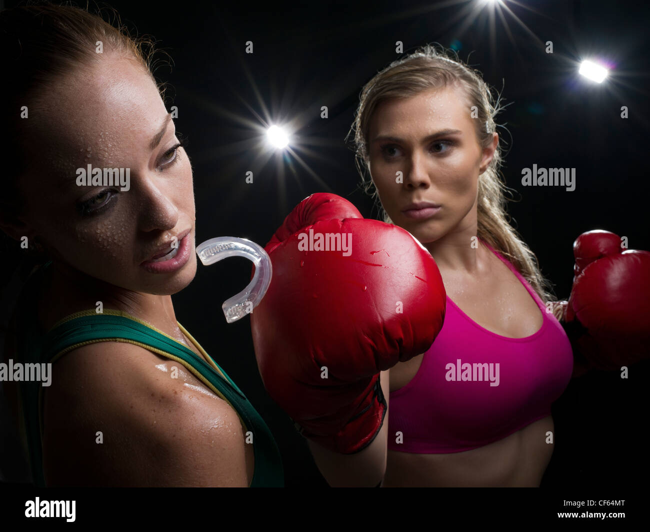 Female Boxing Knockout punch Stock Photo