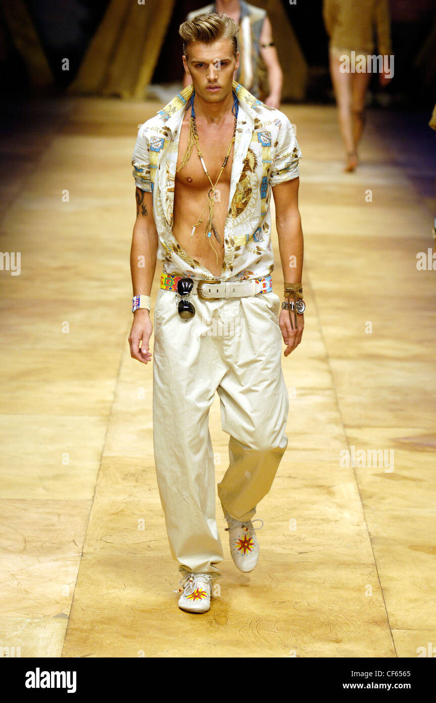 Dolce & Gabbana Milan Ready to Wear Menswear Spring Summer Blonde male  model walking on the runway wearing an open button down Stock Photo - Alamy