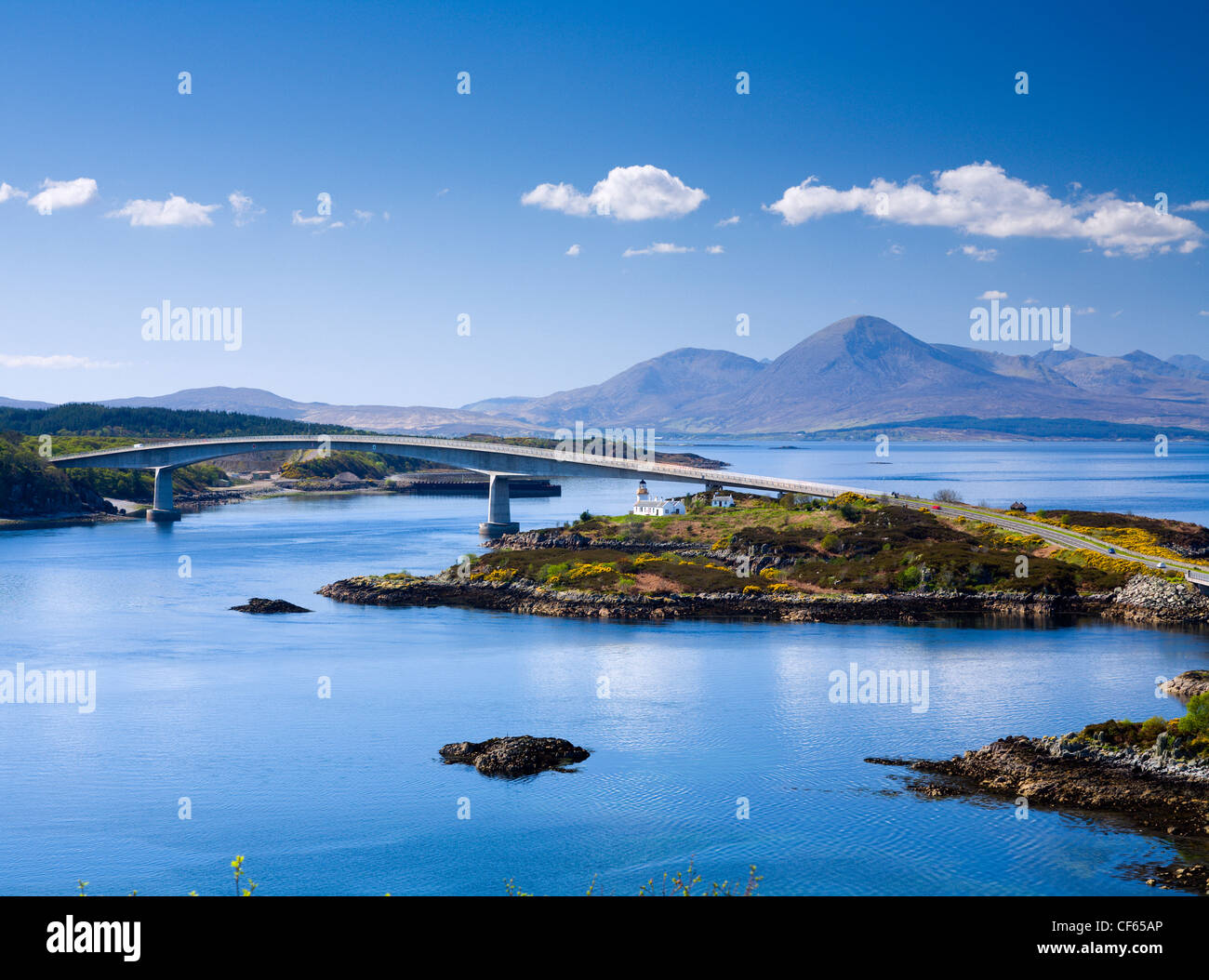 The Skye Bridge connecting Kyle of Lochalsh on the Scottish mainland to Kyleakin on the Isle of Skye. The Red Cuillin can be see Stock Photo