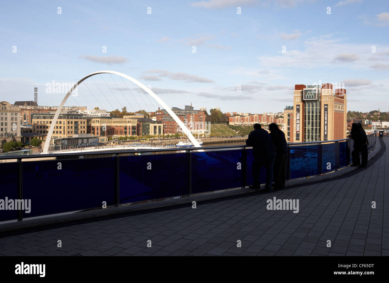 Millennium Bridge, Baltic and onlookers. This foot and cycle bridge was opened in 2001 and won the Royal Institute of British Ar Stock Photo