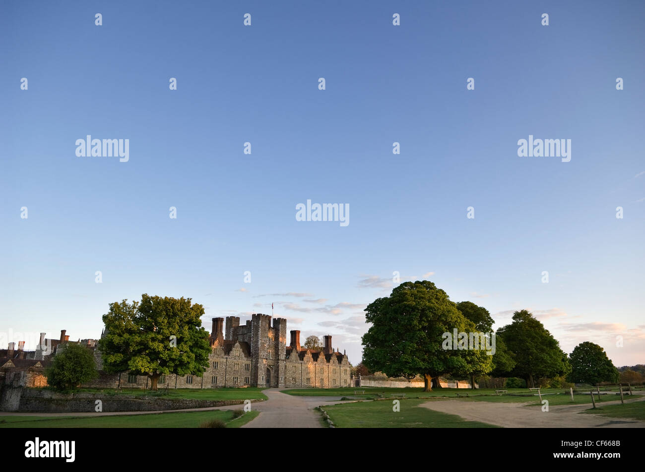 Knole House (birthplace of novelist and poet Vita Sackville-West) and park in the low evening light. Stock Photo