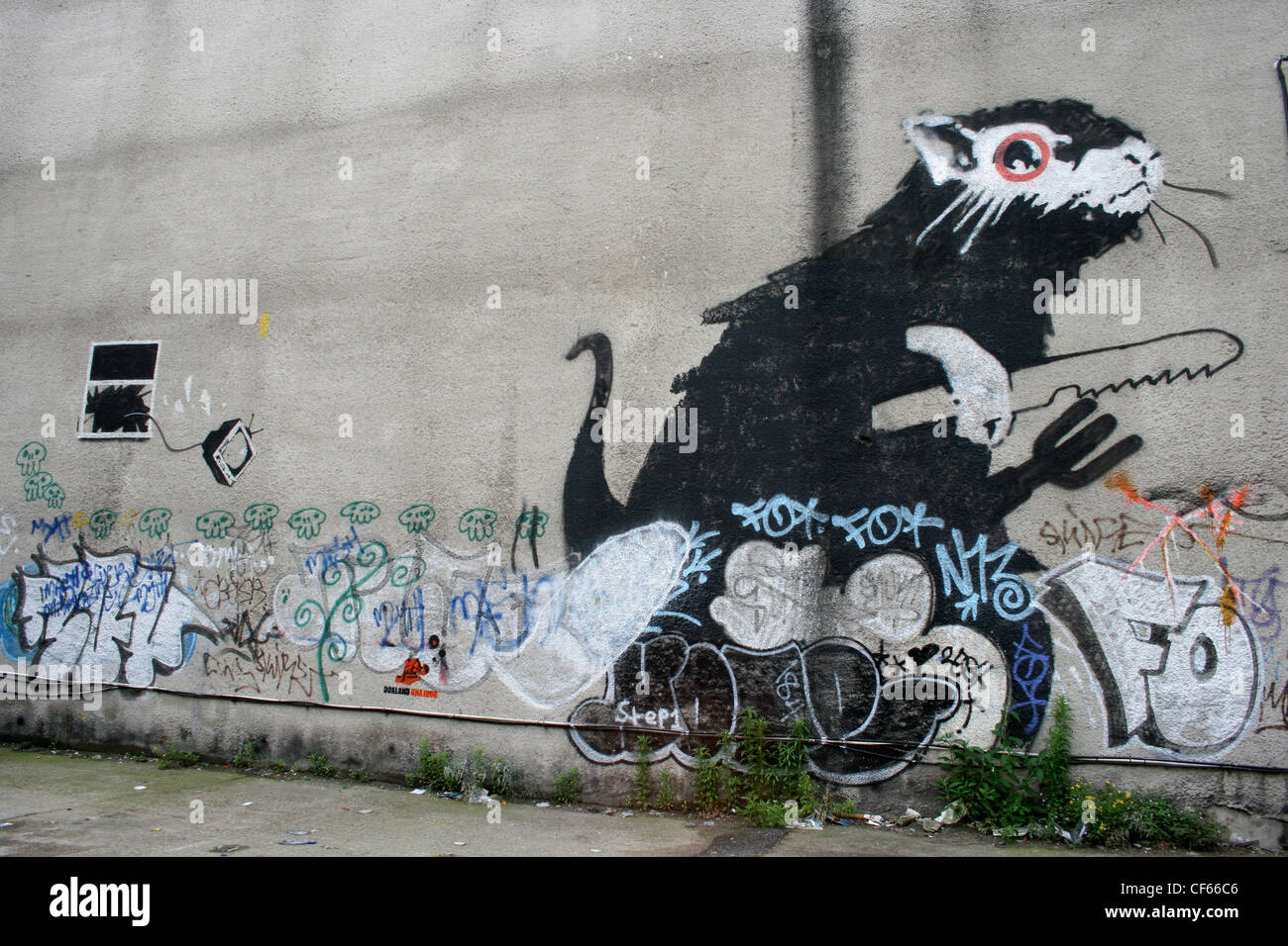 Giant rat graffiti by the artist known as Banksy. Stock Photo