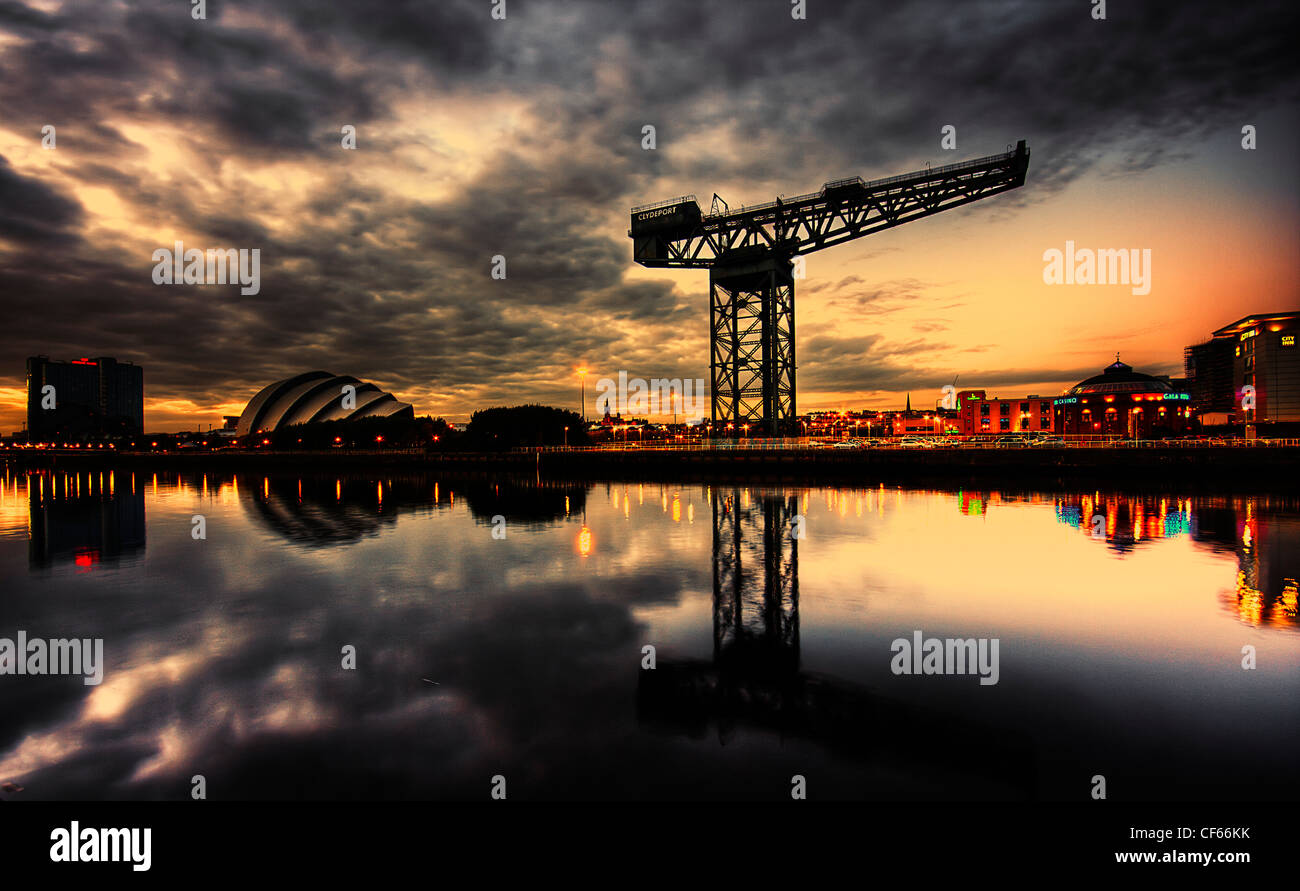 A view across the River Clyde toward the Finnieston Crane in Glasgow. Stock Photo