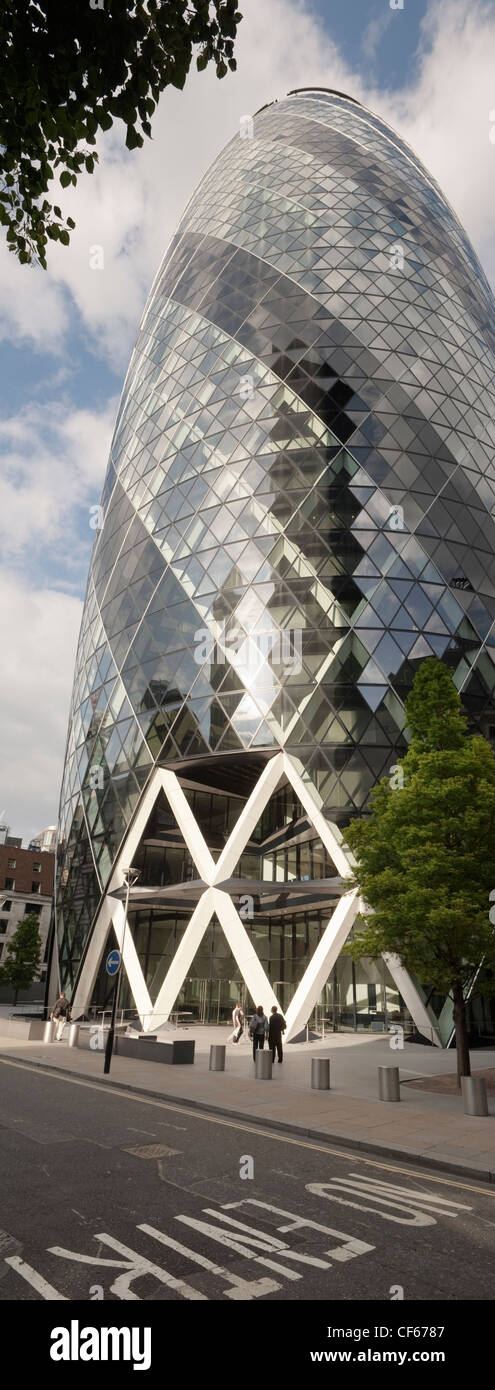 30 St Mary Axe, also known as the Gherkin and the Swiss Re Building in the City of London. Stock Photo