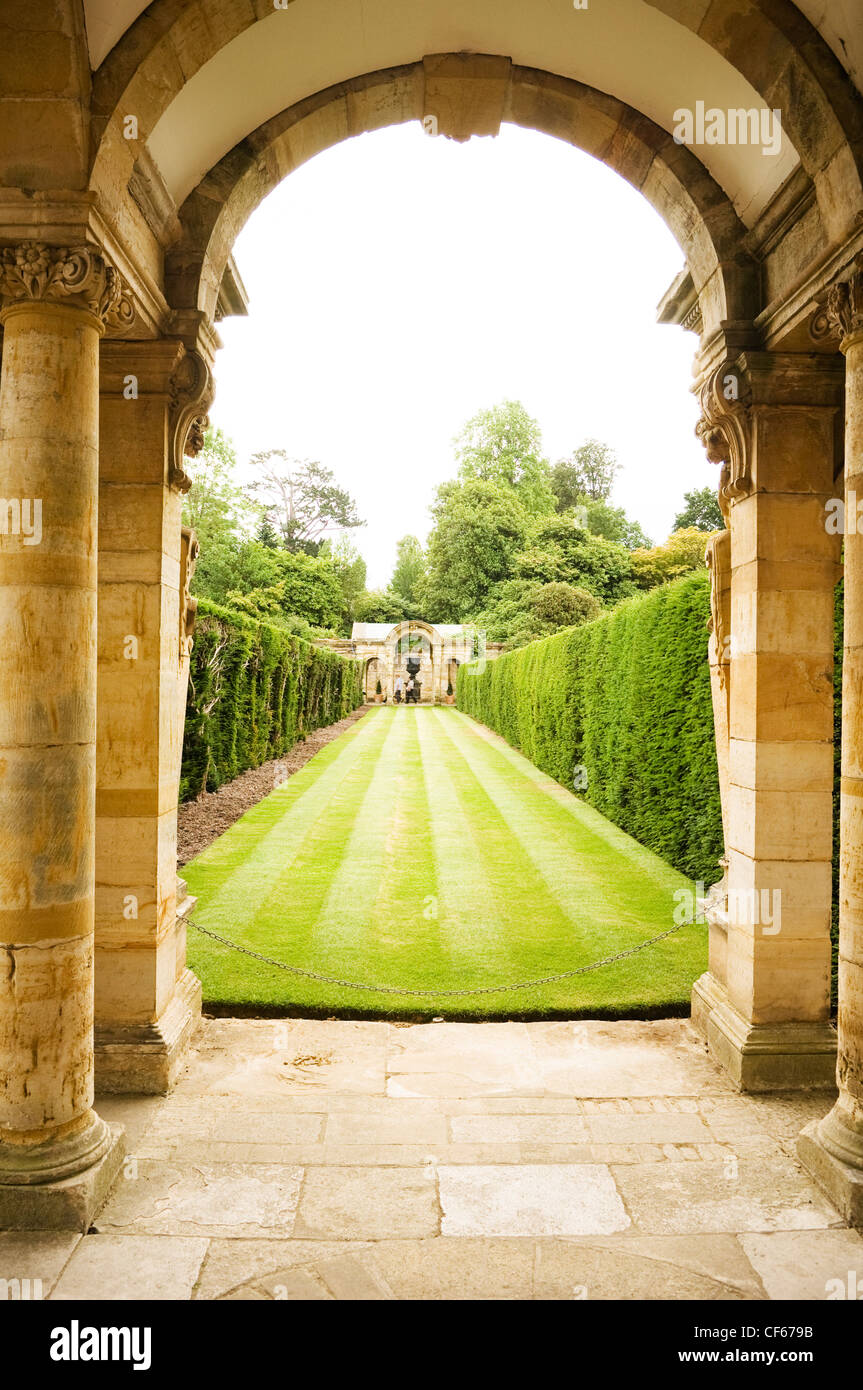 View of garden through an archway in the gardens at Hever Castle. Stock Photo