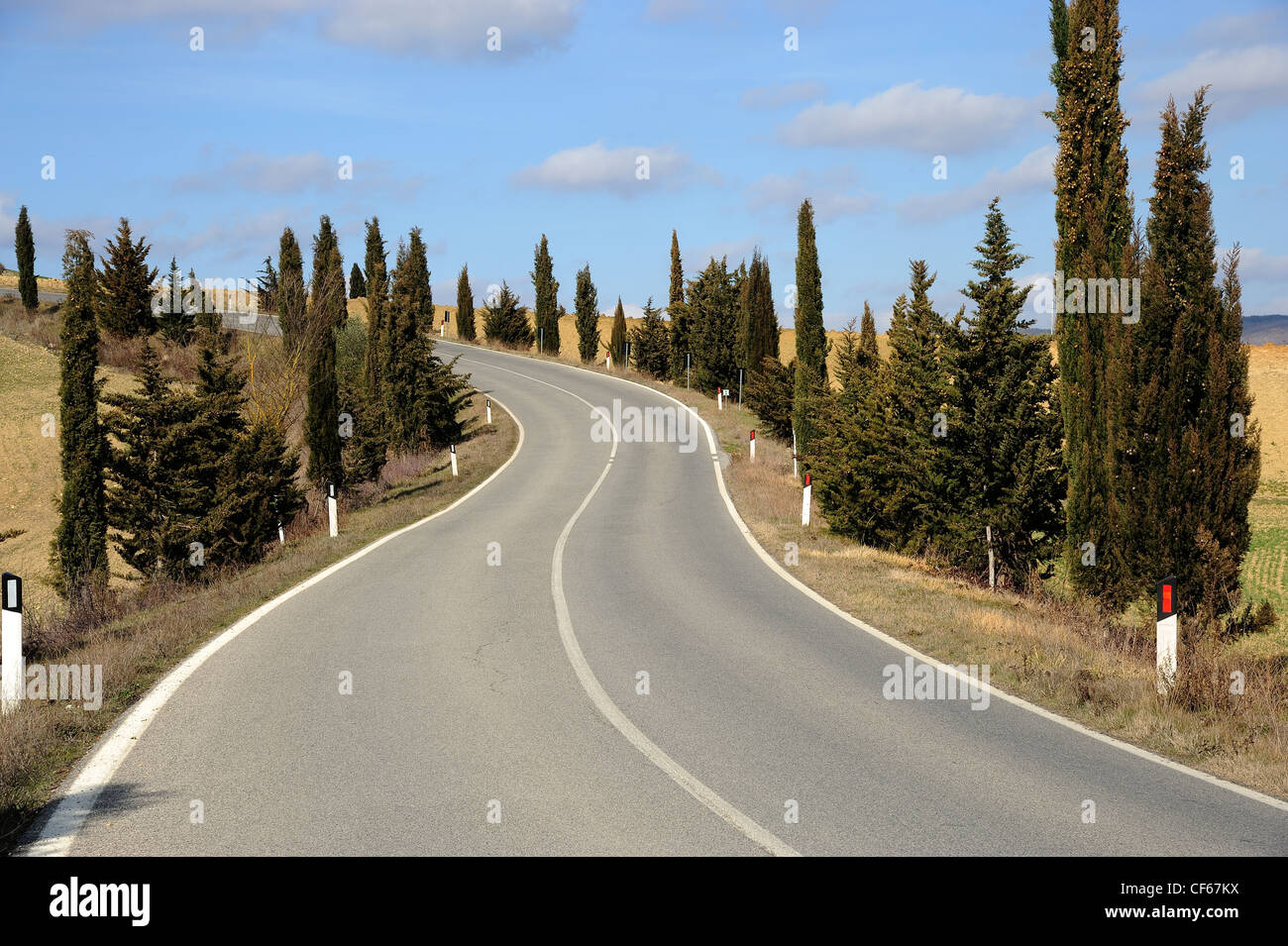 Open road in Tuscany in a sunny day Stock Photo