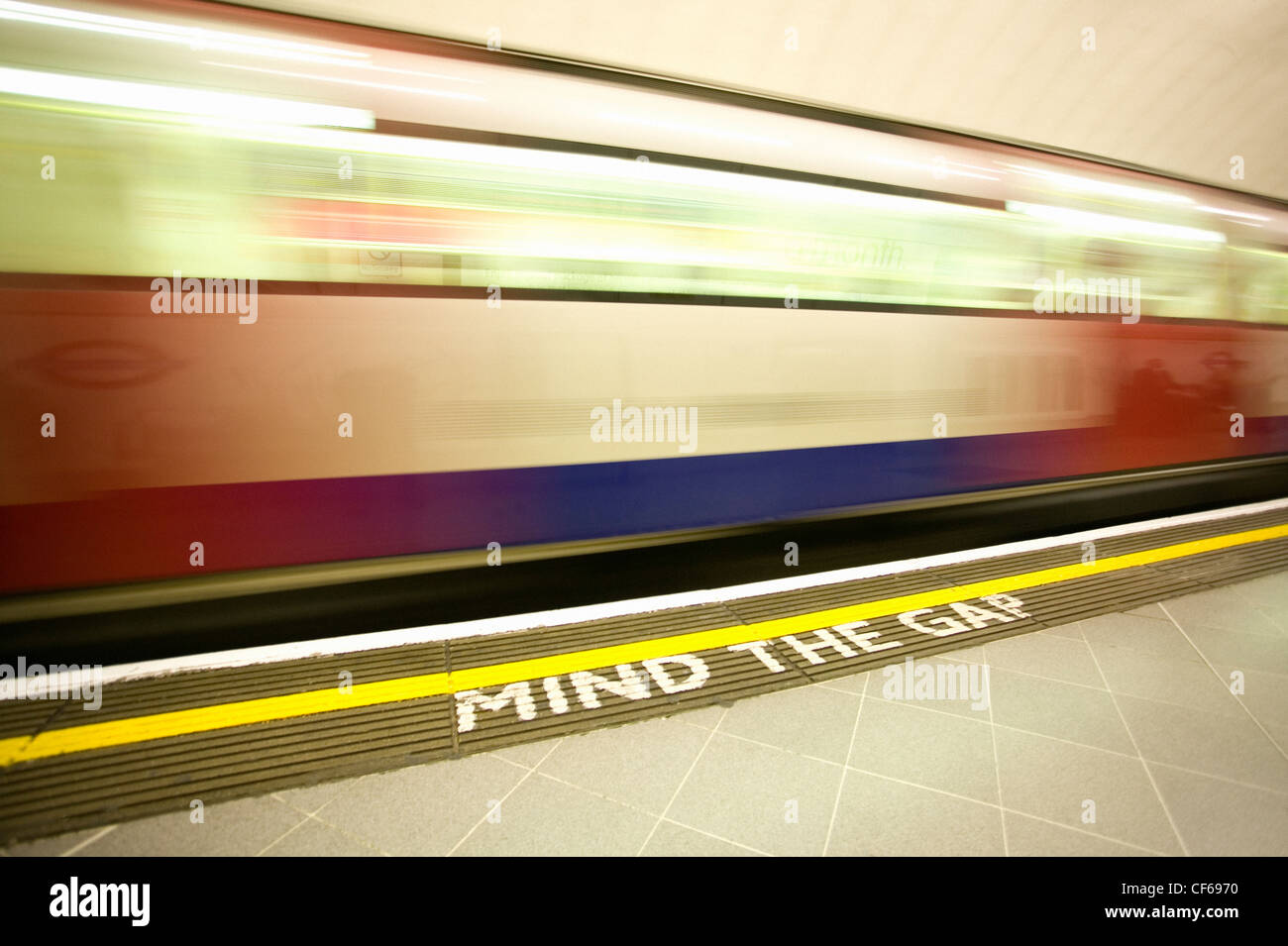 A District tube line train at Westminster station. The district line