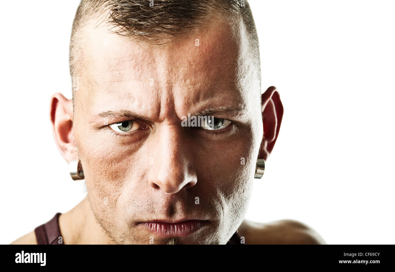 Closeup portrait of a harsh man; isolated on white Stock Photo