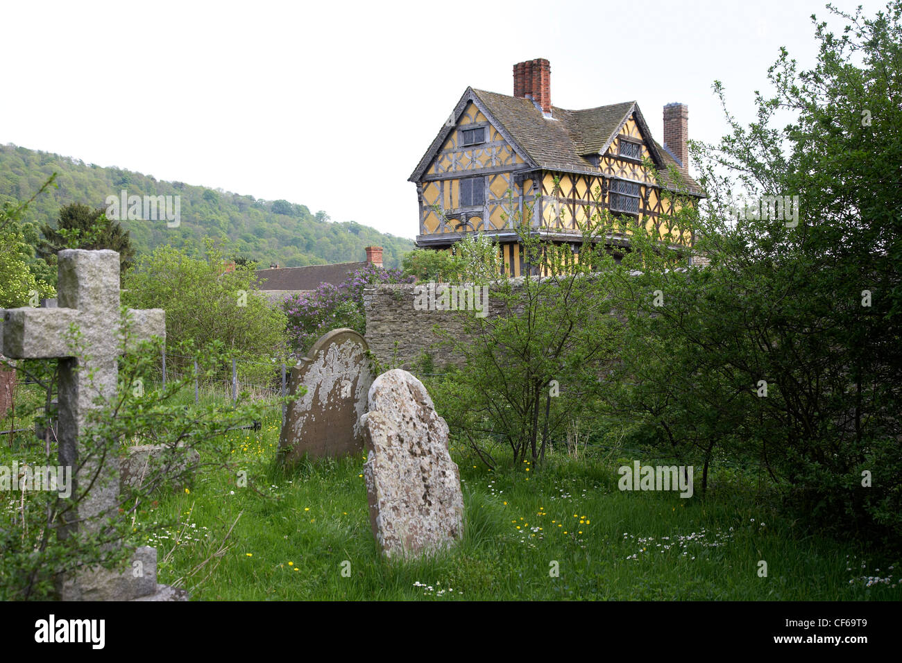 View across the graveyard to Stokesay Castle gatehouse in Shropshire. Stock Photo