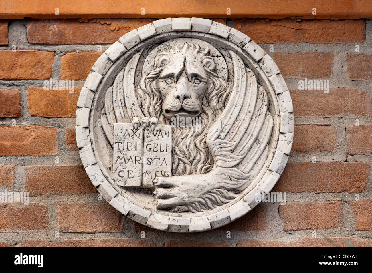 Lion of Saint Mark, marble carving, white bas-relief Stock Photo