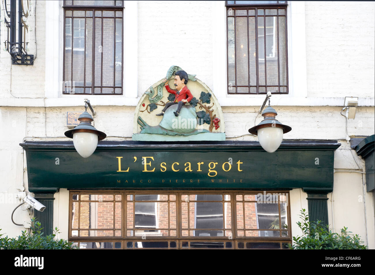 Exterior view of the front of L'Escargot  restaurant in Soho. Stock Photo