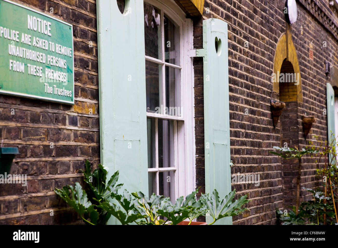 A shuttered window from a house exterior in the East End of London. Stock Photo