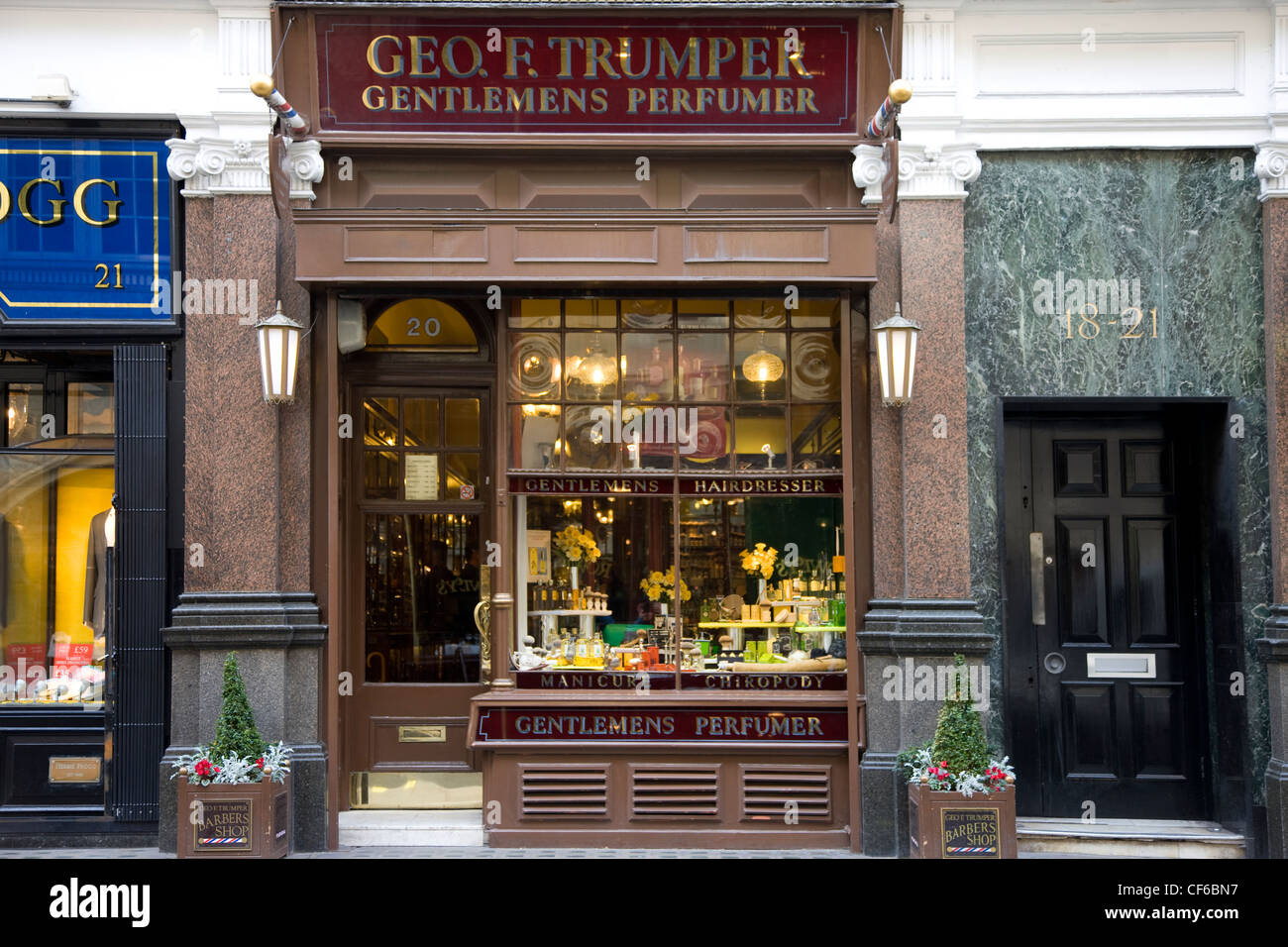 The frontage of a traditional gentlemans hairdresser in the City of Westminster. Stock Photo