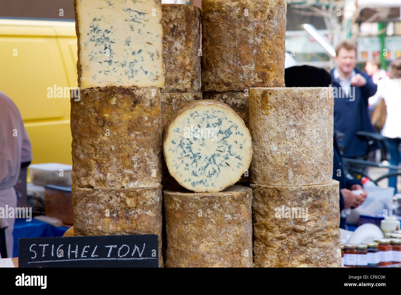 Truckles of Stichelton cheese at Borough Market in London Stock Photo