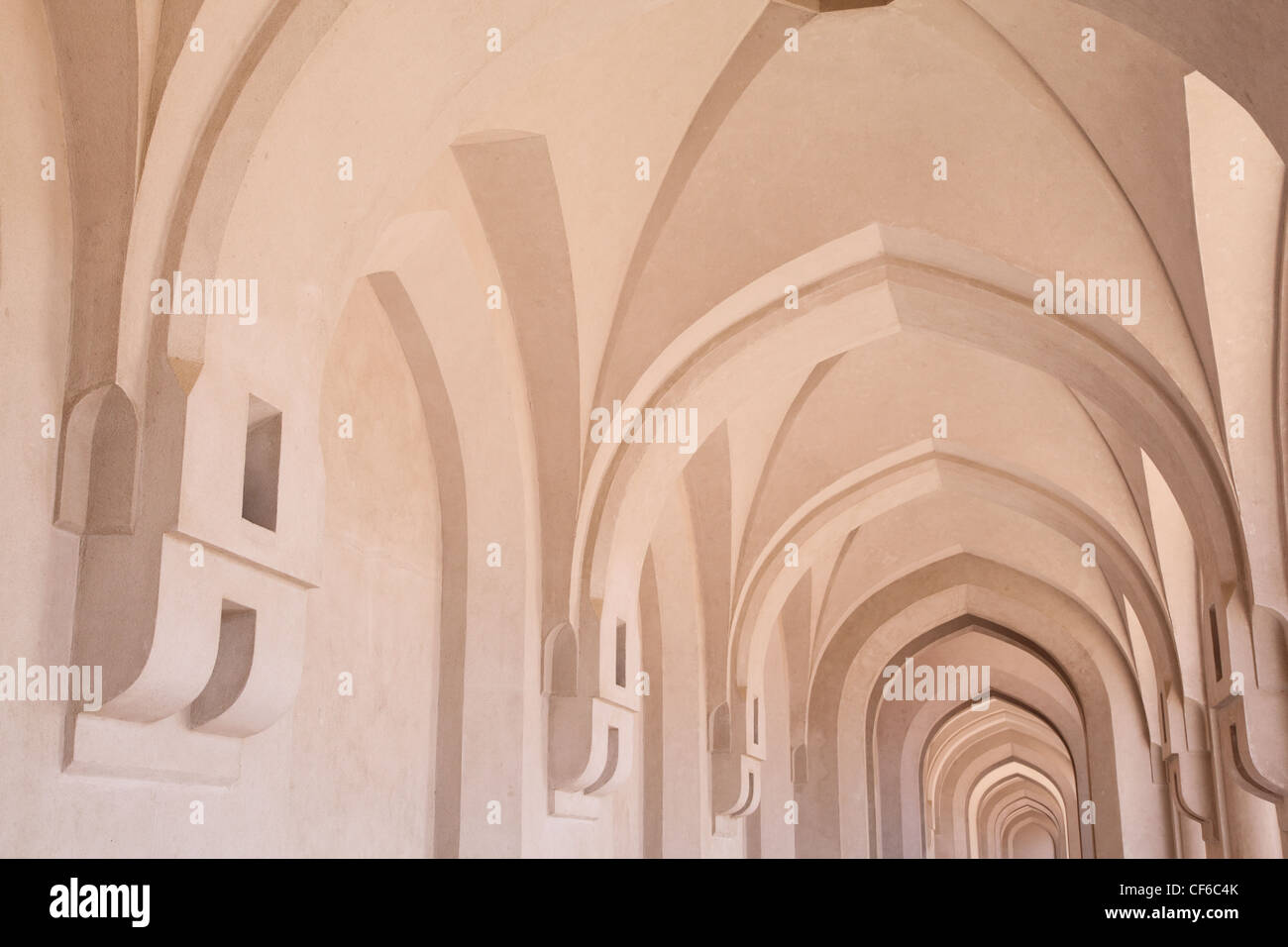 greatful big corridor inside Sultan's Palace in Oman. Arcs. Stock Photo