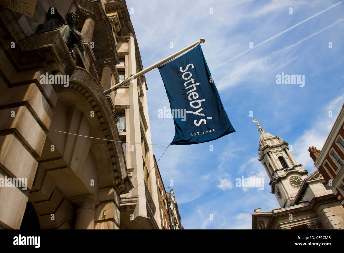 Flag flying above the entrance to Sotheby's in London. Stock Photo