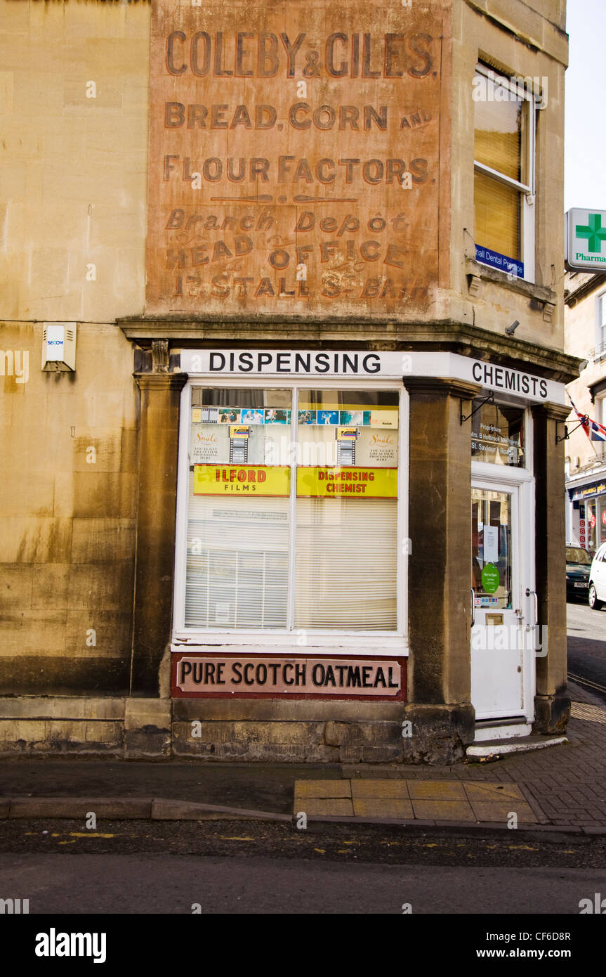 Independent dispensing chemists and ghost sign in Larkhall Stock Photo