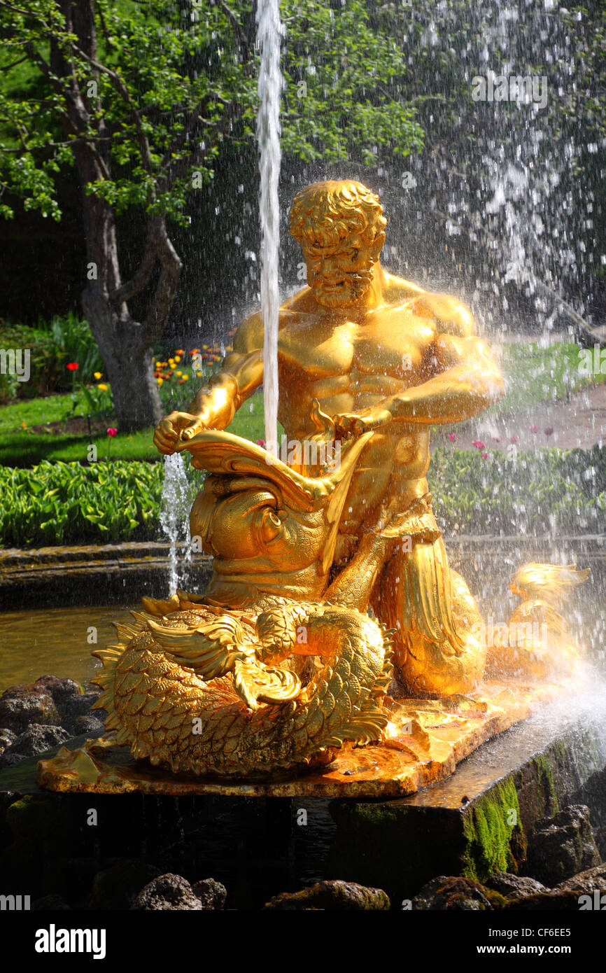 Fountains is Orange or Triton, tearing chaps marine monster of Petergof, Saint Petersburg, Russia Stock Photo