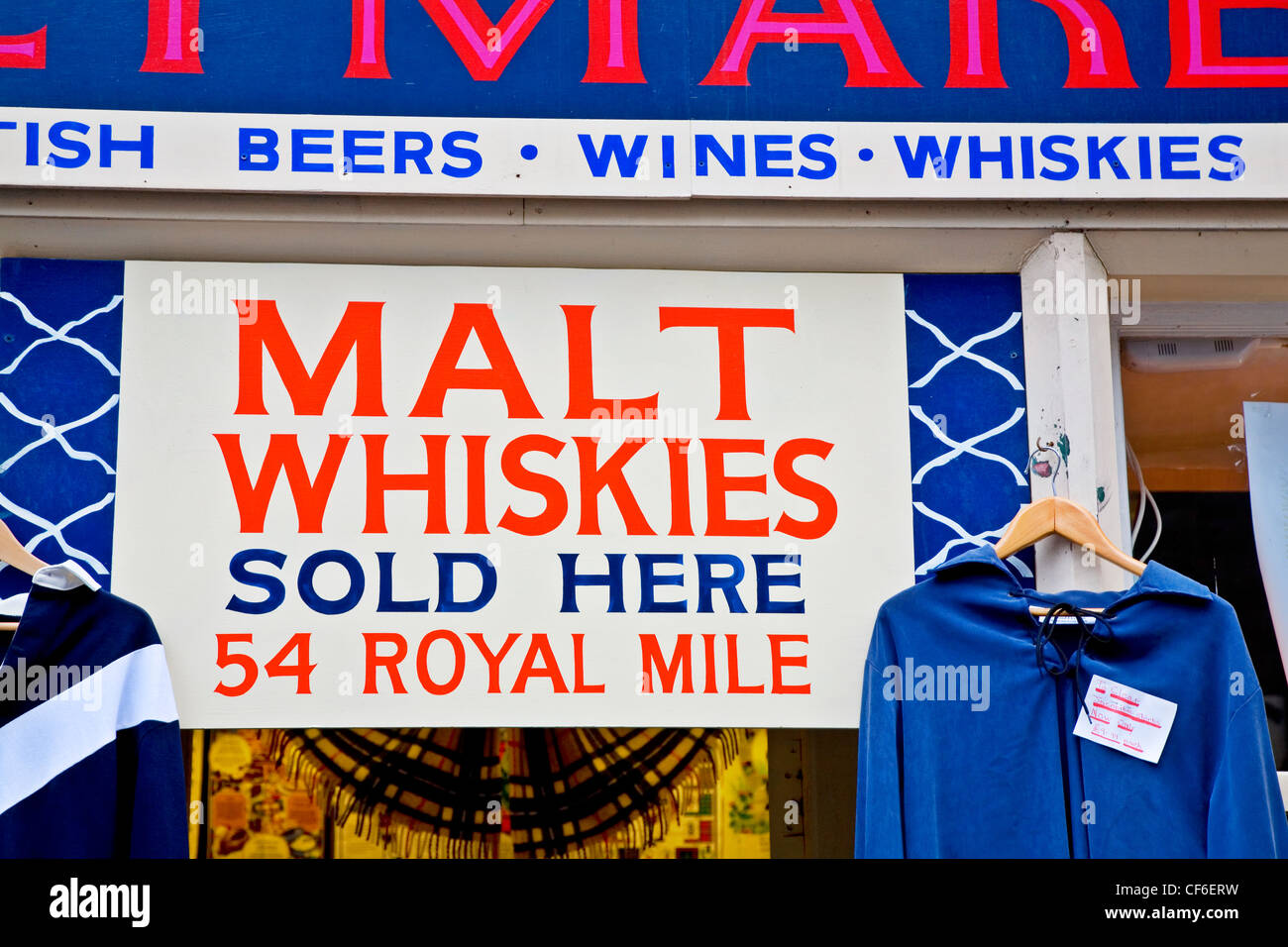 Shop signage advertising malt whisky. Stock Photo