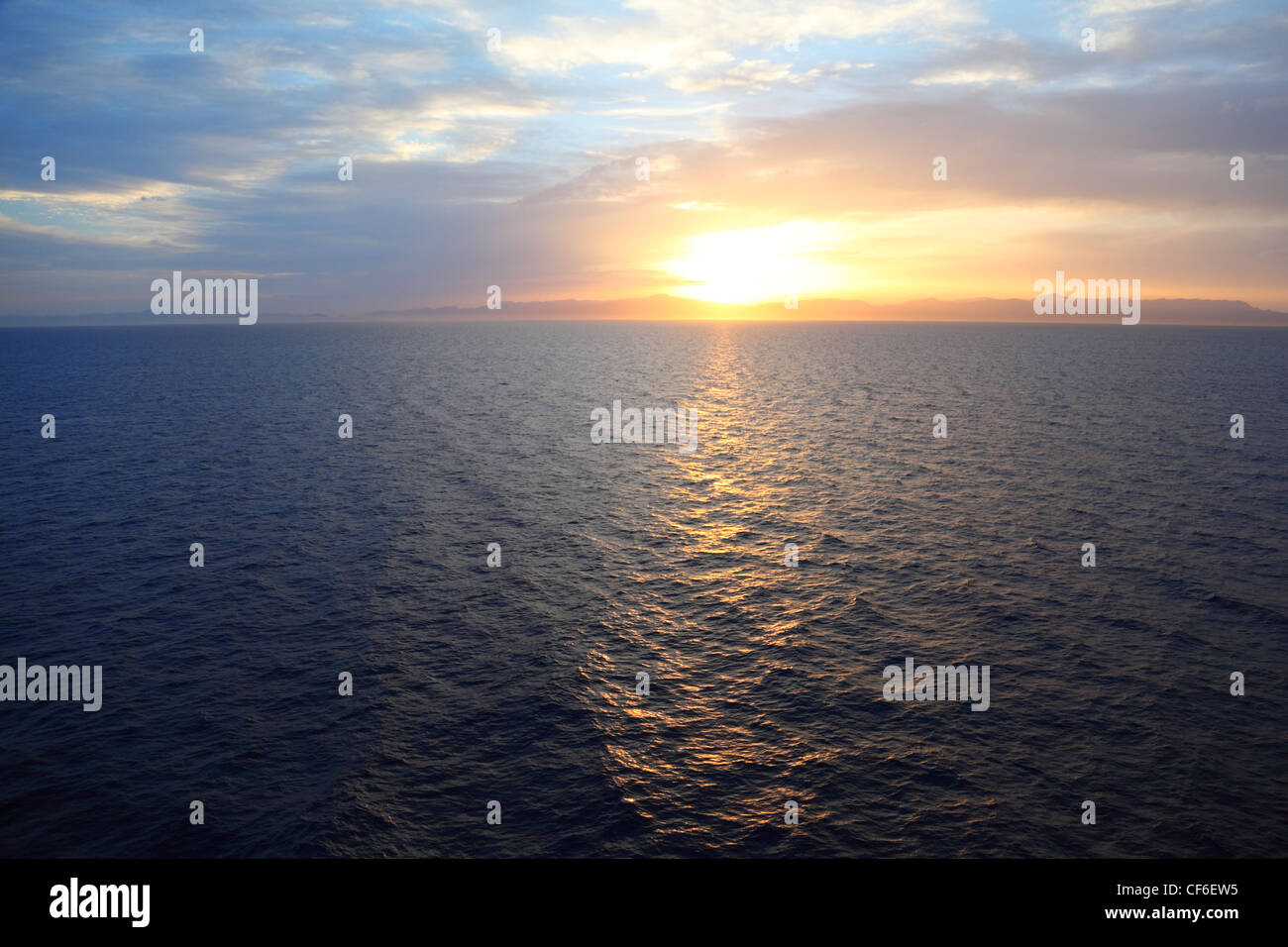 beautiful sunset under water. view from deck of cruise ship. Stock Photo
