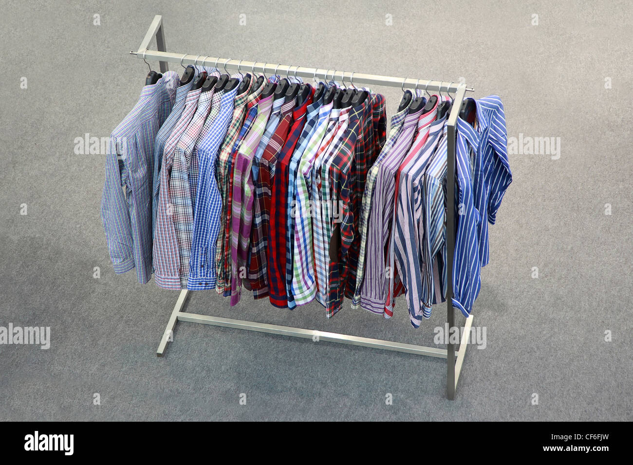 Man's shirts at  exhibition stand in  show room Stock Photo