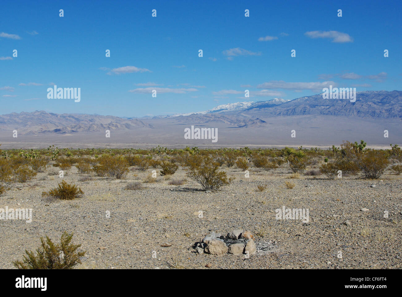 Fire Pit Vast Desert And High Snowy Mountain Range Near Mount