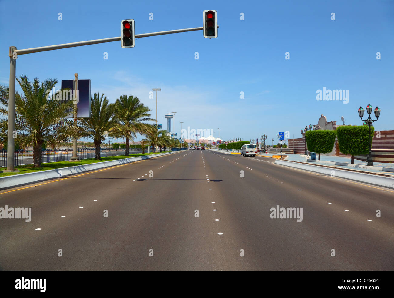 The road with hanging traffic lights to the Marina mall in Abu Dhabi, UAE. Stock Photo