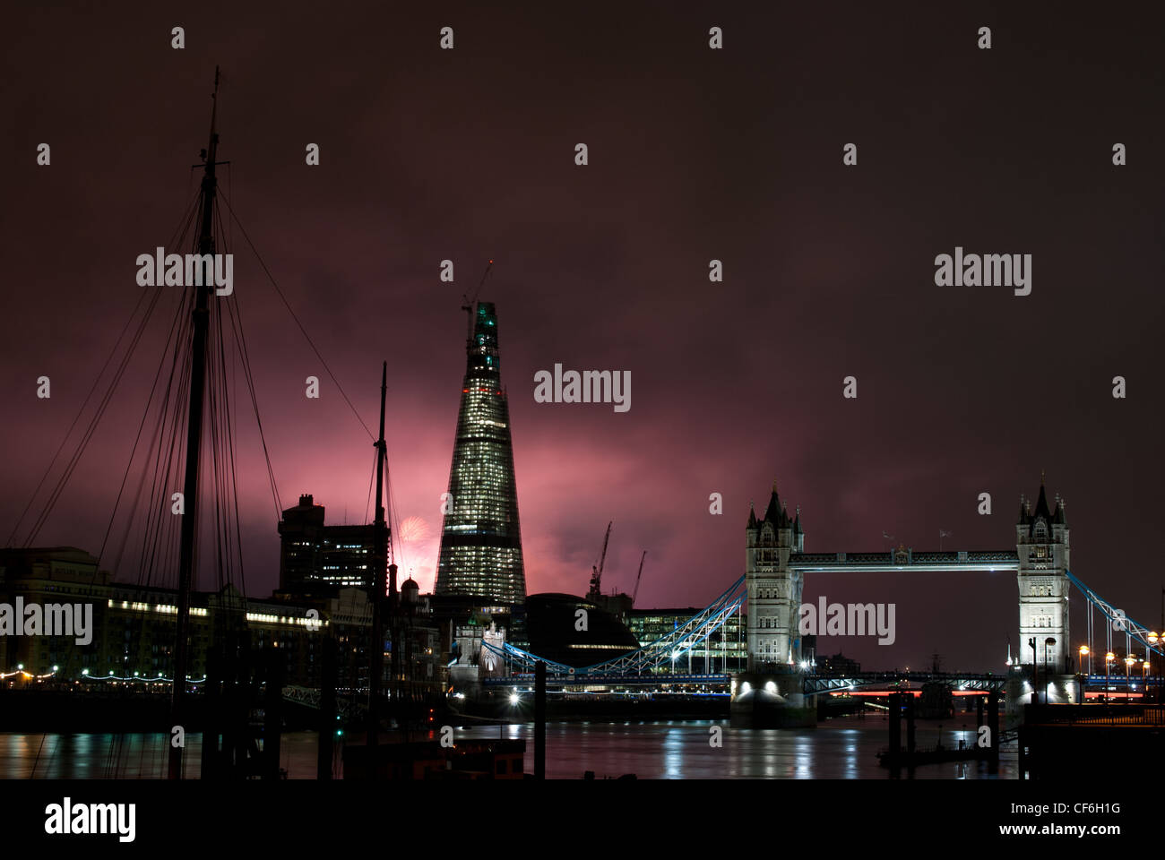 Tower Bridge, the Shard and river  Thames  New Years Eve fireworks Stock Photo
