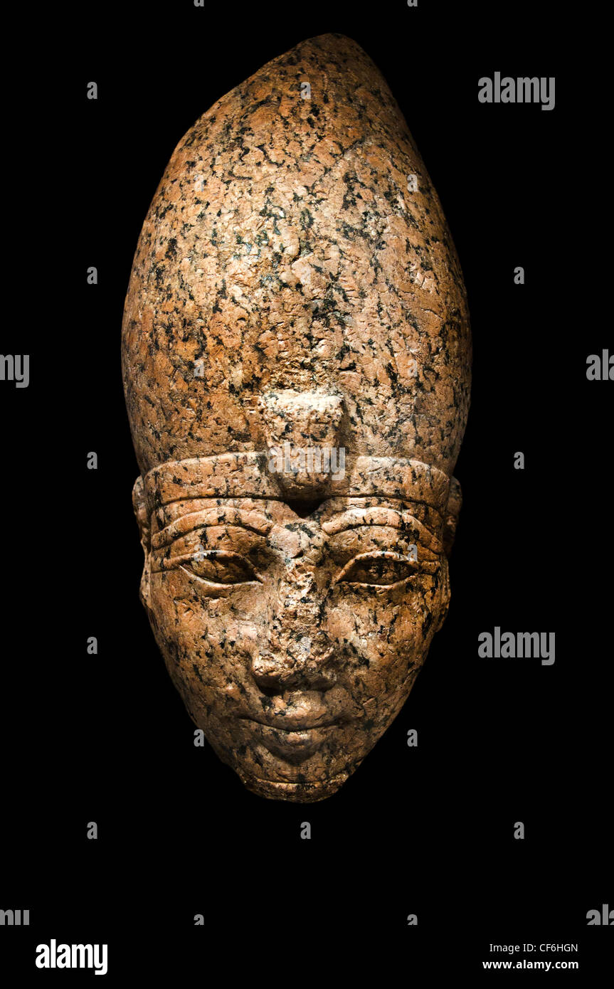 Red granite head pharaoh Hatshepsut or Thutmose III 18th  New Kingdom of Ancient Egypt 1479–14 BC Hedjet  (white crown of Upper Egypt) Louvre Museum Stock Photo