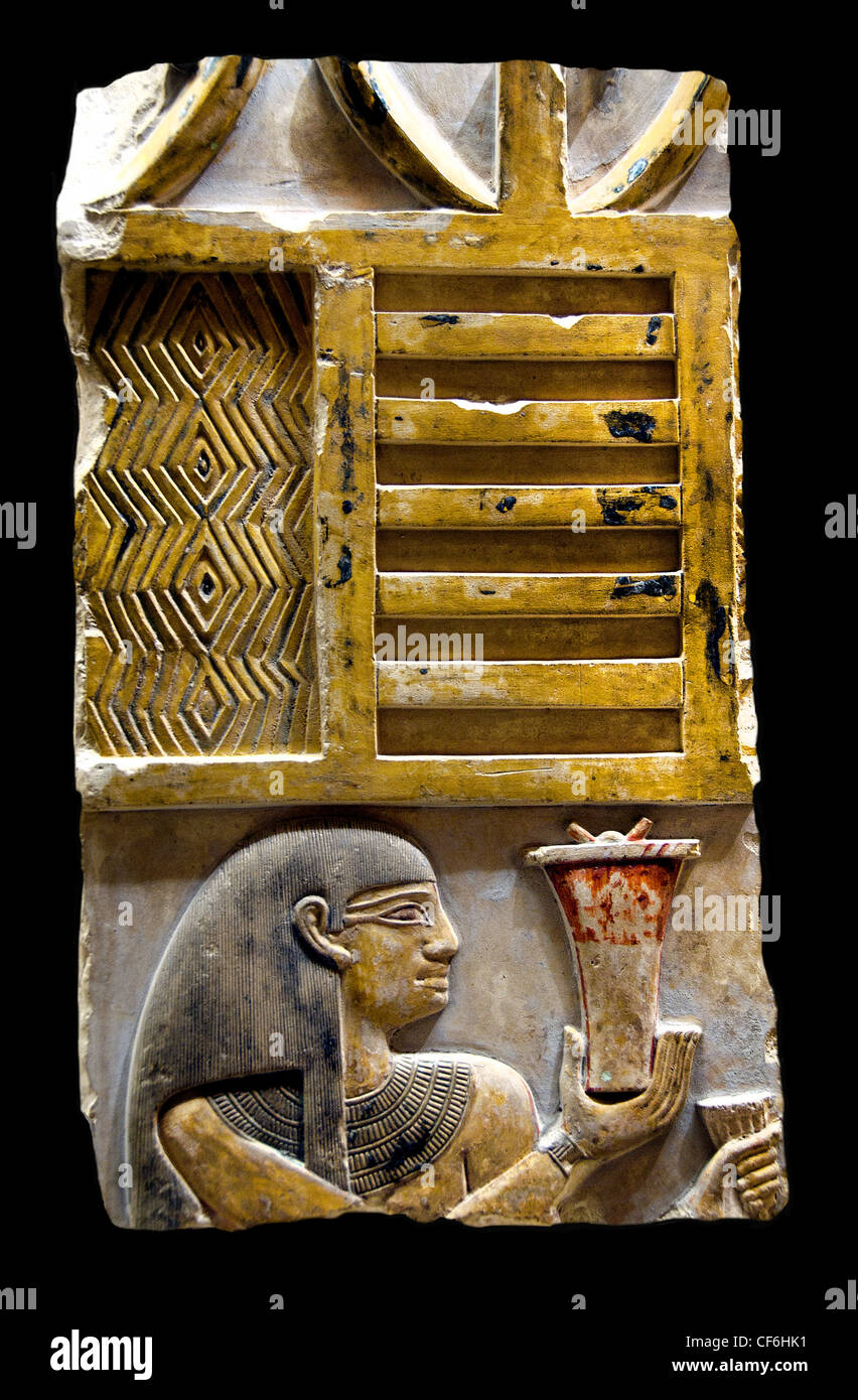 woman holds a vase of offering reign of Mentuhotep Nebhepetre 2033 - 1982 BC 11th Dynasty relief Deir el-Bahari Egypt Egyptian Stock Photo