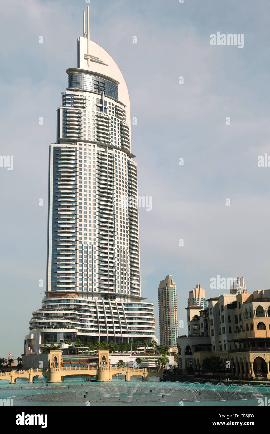 DUBAI - APRIL 17: Burj Dubai Lake Hotel and other buildings near water, sunny day, 17 april 2010 in Dubai, UAE Stock Photo