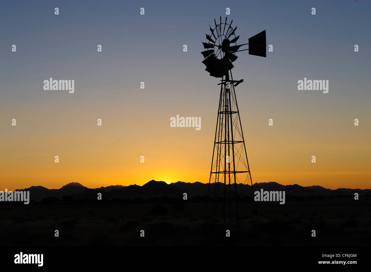Windmill at sunset, Namib Desert, Namibia. Stock Photo