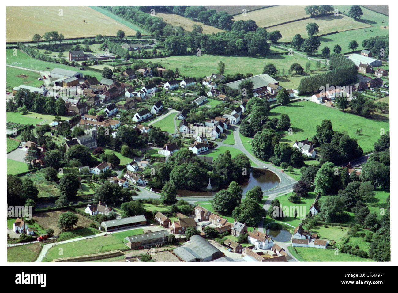 oblique aerial view of the village of bishop Burton in east Yorkshire, showing village pond in foreground Stock Photo
