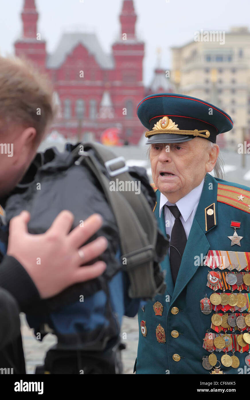 MOSCOW RUSSIA APRIL 24 Great Patriotic War veteran being interviewed by local television company April 24 2010 Moscow Russia. Stock Photo