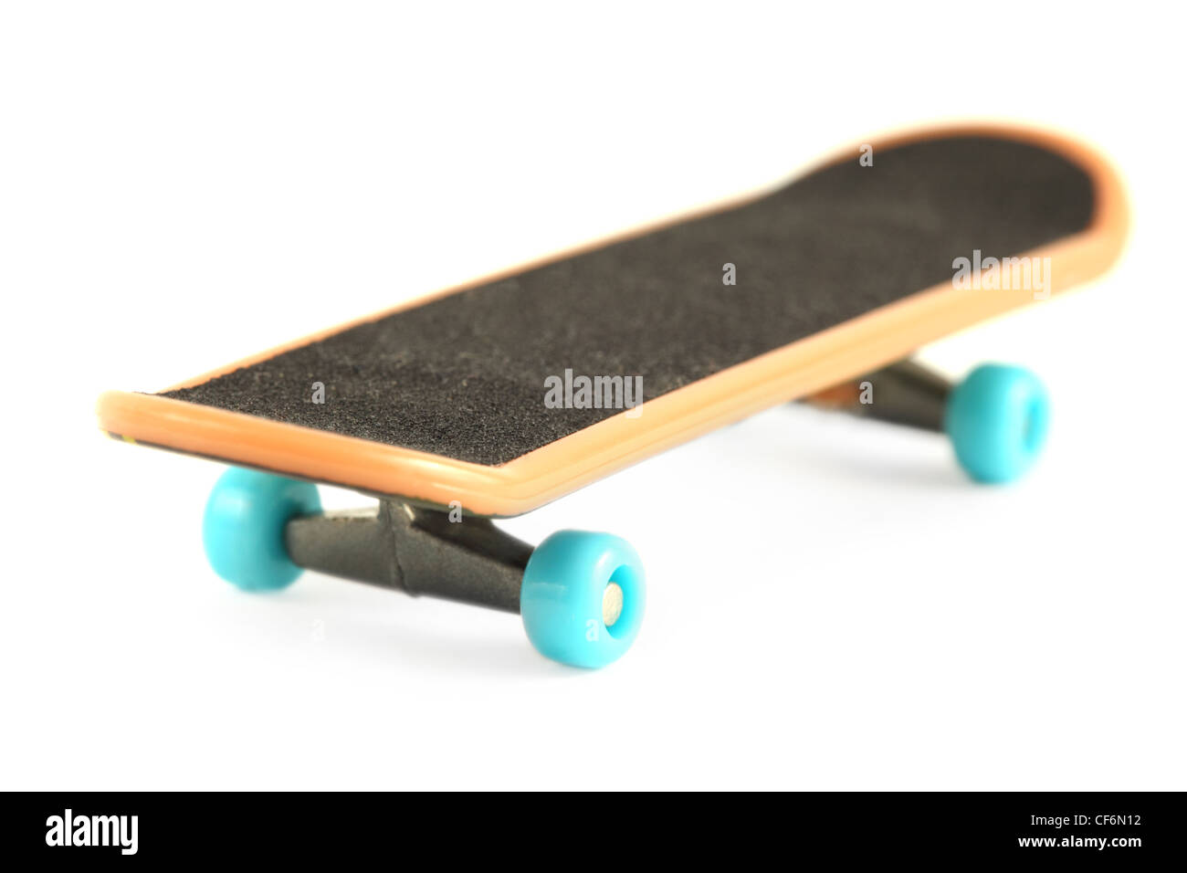 Black skateboard with yellow edge and blue wheel isolated on white Stock Photo