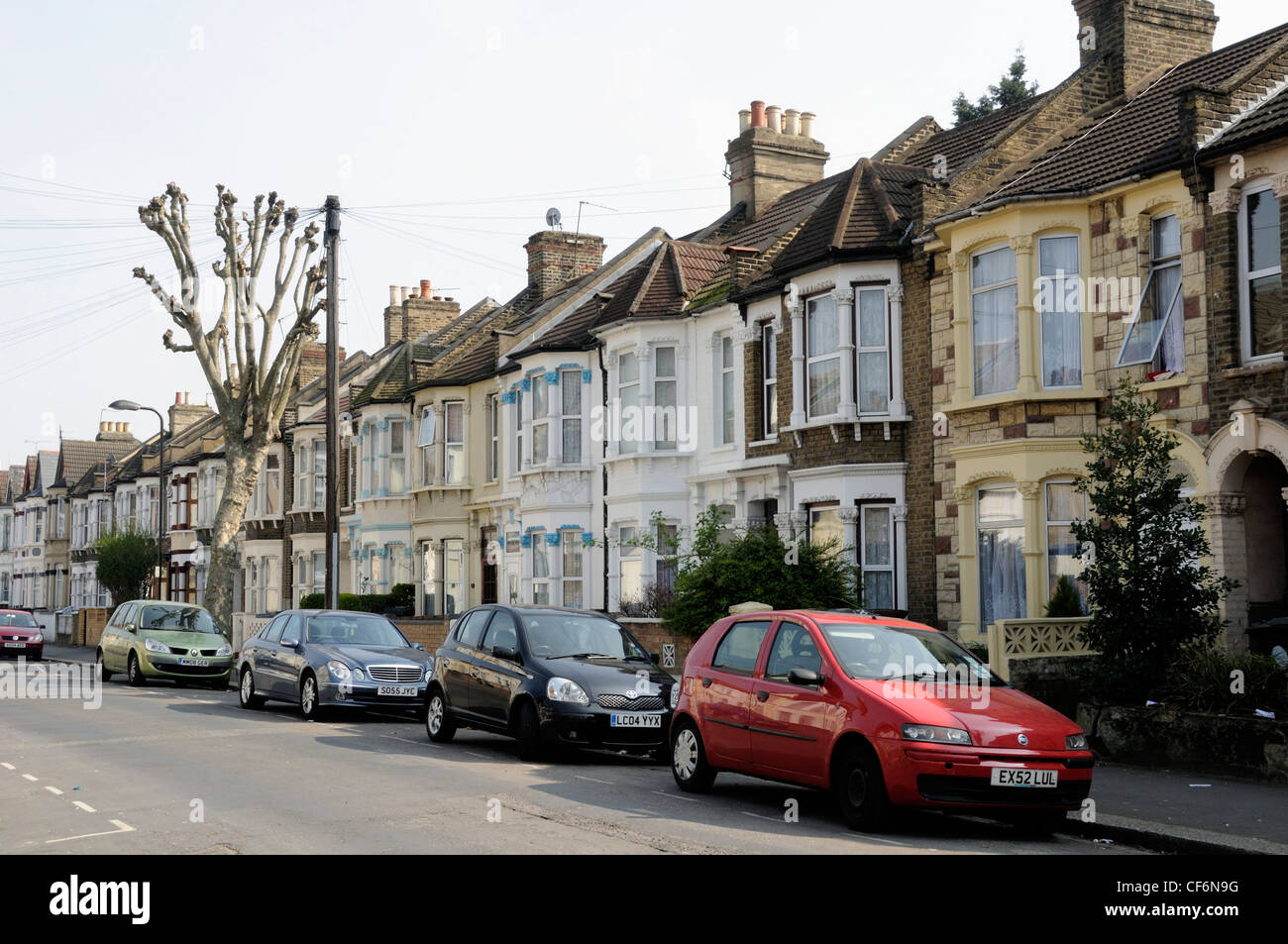 Row of two story residential terraced houses Leyton Leytonstone London