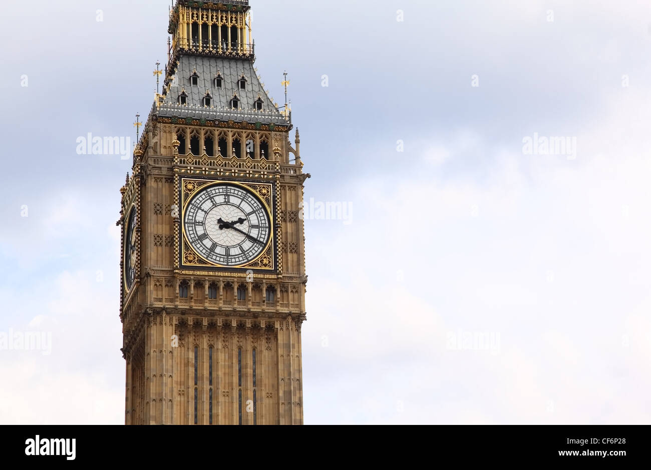 Big Ben is a famous English clock chimes in the Gothic style in London. Big Ben is one of London's best-known landmarks Stock Photo