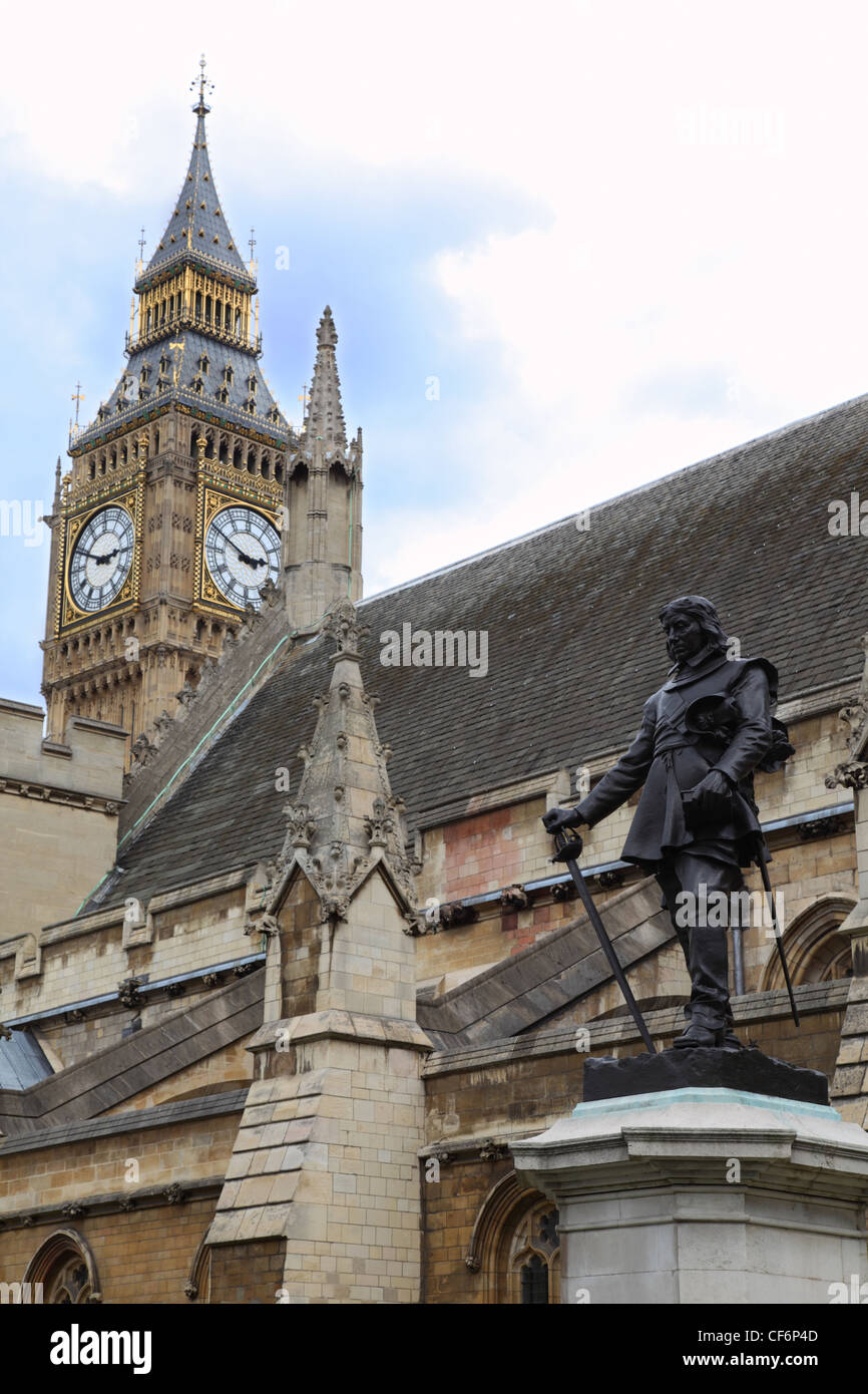 Statue Oliver Cromwell at Westminster Big Ben Clock Tower London Oliver Cromwell тАУ english revolutionary regicide lord Stock Photo