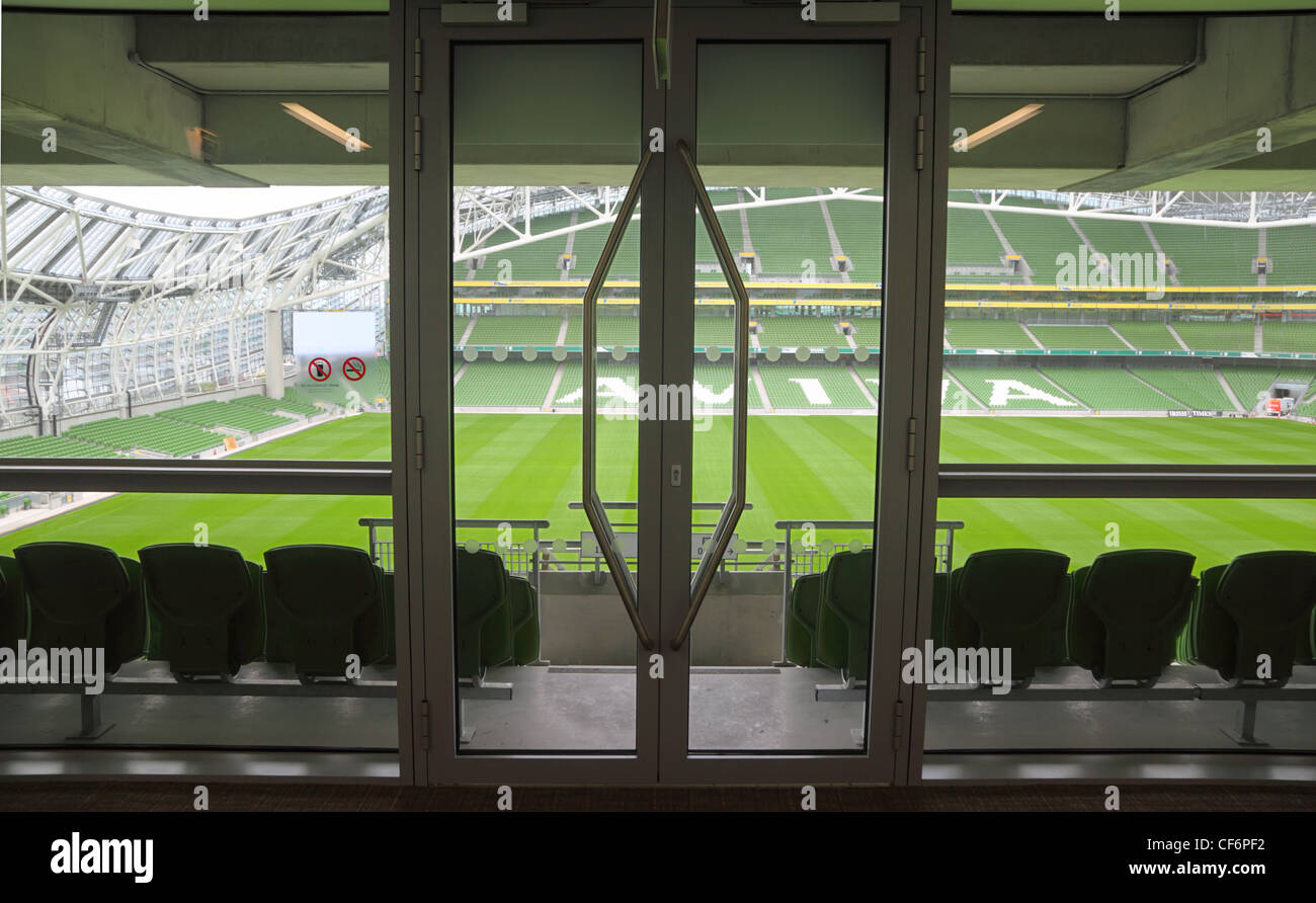 DUBLIN JUNE 10: Door rows green folding seats in big empty stadium Aviva June 10 2010 in Dublin Stadium Aviva after repair Stock Photo