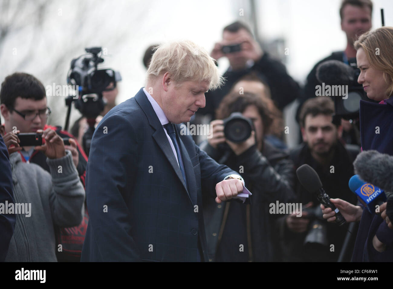 Boris Johnson, the Mayor of London checks the time Stock Photo