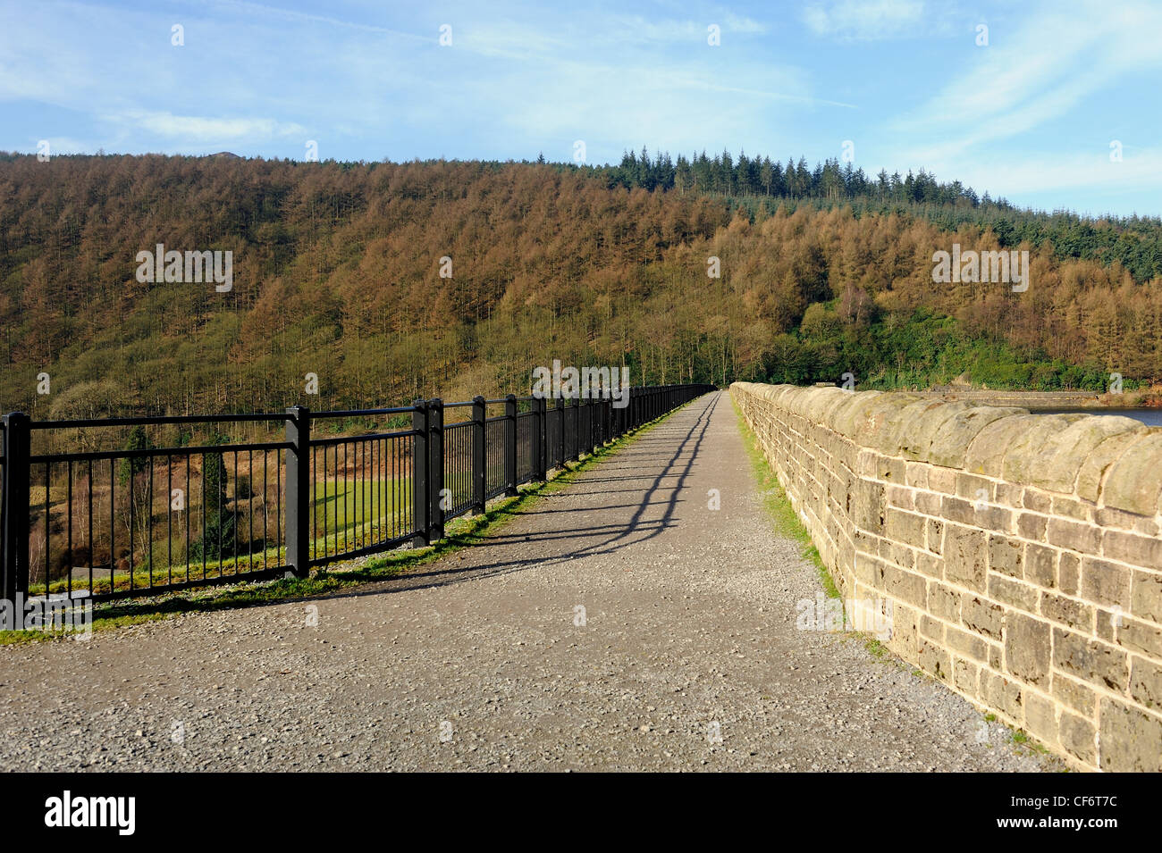 pathway across ladybower dam wall derbyshire england uk Stock Photo