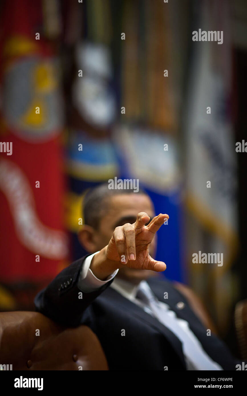 President Barack Obama gestures during a fiscal policy meeting in the Roosevelt Room of the White House April 4, 2011 in Washington, DC. Stock Photo