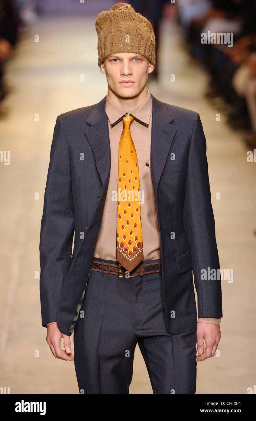 Prada Milan Menswear Ready to Wear Autumn Winter Knitted hat and purple  suit Stock Photo - Alamy