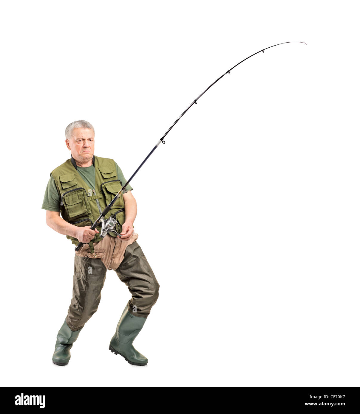 full length portrait of a mature fisherman holding a fishing pole CF70K7