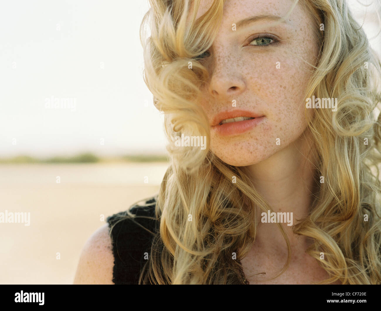 Female with long curly blonde hair and freckles Stock Photo - Alamy Female with long curly blonde hair and freckles Stock Photo - Alamy