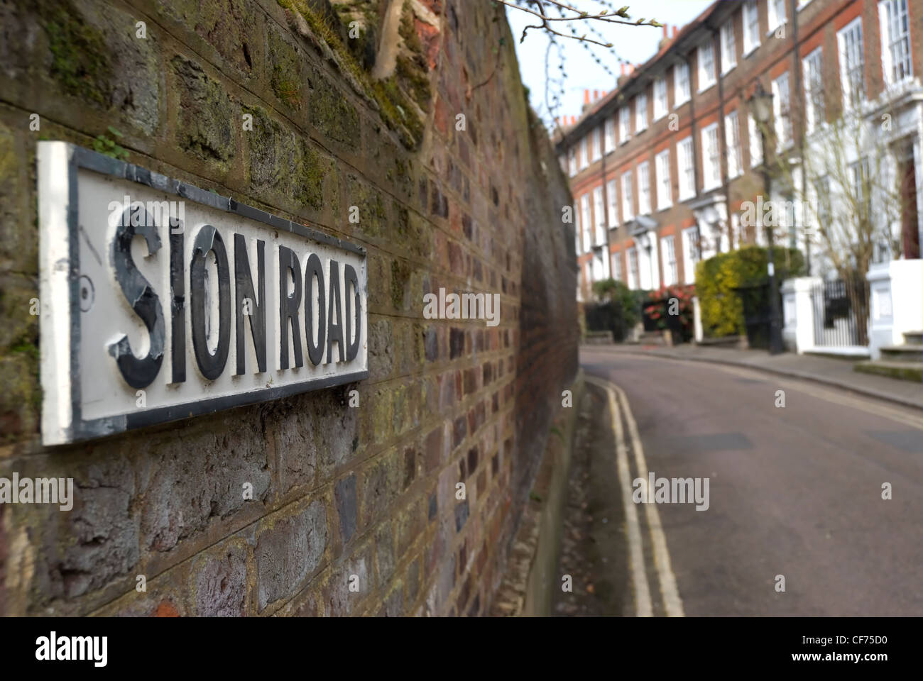 street name for sion road, twickenham, middlesex, england, lined by